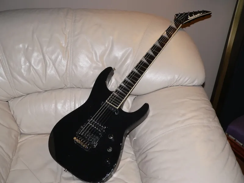 Potato quality photo of a Jackson Soloist guitar